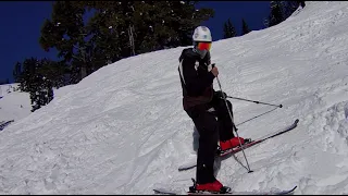 Beginner ski lesson down a Black Diamond