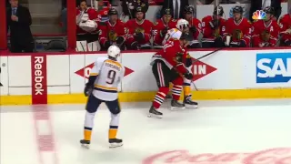 Predators' Mike Ribeiro punches Andrew Shaw (Blackhawks) on the bench