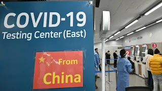 Reisende aus China müssen in Deutschland Corona-Test vorlegen | AFP