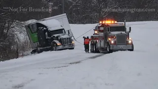 TRUCK DRIVER NEARLY HITS HIGHWAY PATROL CAR IN IOWA DURING WINTER STORM