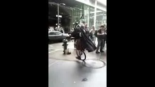 Darth vader playing star wars theme on bagpipes riding a unicycle