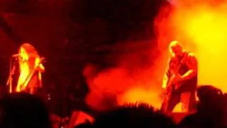 Tom Araya of Slayer pushes down a random fan live