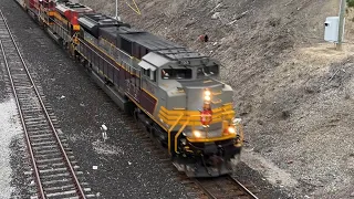 Heritage! CPKC 734 emerges out of the tunnel with 7013 leading!