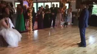 Groom serenades his Bride