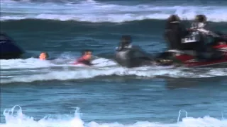 Champion surfer escapes shark attack live on TV