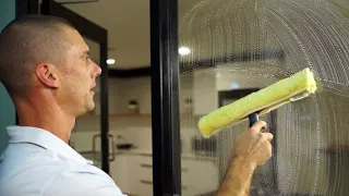 XO2® | How to use a window squeegee to clean glass