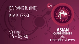 1/2 FS - 65 kg: B. BAJRANG (IND) df. K. KIM (PRK), 3-2