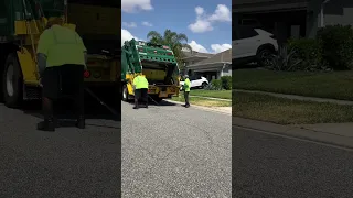 Bulk trash truck collecting  furniture