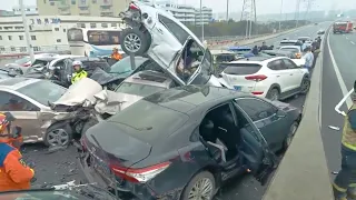 In China now! Over 100 cars destroyed in frozen street as ice rain hits multiple cities