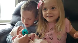 Kids meeting the newborn baby sister for the first time!