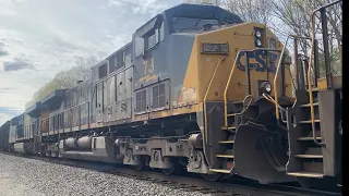 Medium sized CSX M426 with 80 cars and heavily burned #73