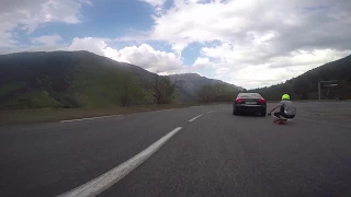 Longboard VS Audi