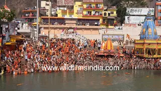 Sea of saffron: sadhus wait at a Ganga Ghat in Haridwar to take a dip during Kumbh Mela 2021