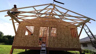 BUILDING THE GUESTHOUSE. Part 8. Getting the plywood on the roof. Front porch framing.