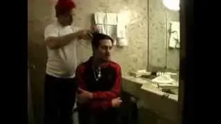 John Frusciante from The Red Hot Chili Peppers getting his long hair cut off