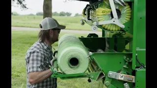 How To Load Net Wrap On A 460M Round Baler | John Deere Tips Notebook