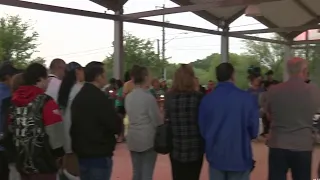 Community members at prayer vigil honor 51 migrants found inside trailer on Southwest Side