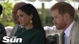 I watched as Meghan put on a brilliant acting performance as Harry stared daggers, royal expert says