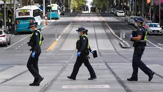 Victoria Police make several arrests as anti-vax protesters gather in St Kilda