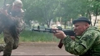 В Луганске боевики одну воинскую часть захватили, другую подожгли