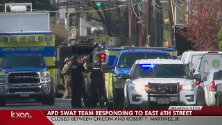 SWAT works to get robbery suspect out of east Austin apartment