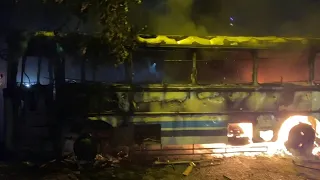 Buses torched outside former PM's residence in Sri Lanka violence | AFP