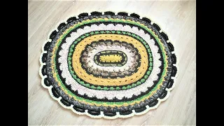 Oval rug crocheted from old things. The author's solution.