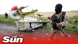 MH17 investigators name four suspects linked to Russia
