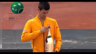 Champagne hit Novak Djokovic  head