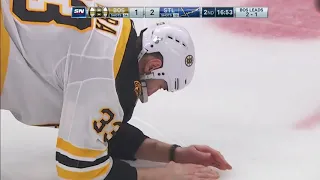 Zdeno Chara blocks puck with is face in Stanley cup finals game 4