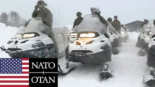 US Marines on snowmobiles during winter exercises in Norway, NATO.