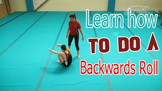 Head Over Heels Gymnastics Tutorials, Learn how to do a Backwards Roll.