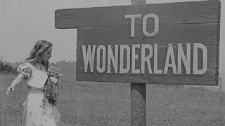 Alice in Wonderland (1915) by W.W. Young, Clip: Alice takes the sign to Wonderland...