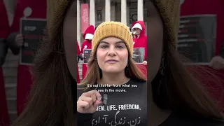 Iranian women stage protest in London inspired by 'Handmaid's Tale'
