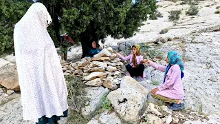 A nomadic woman and her two daughters in search of life in a mountain camping"