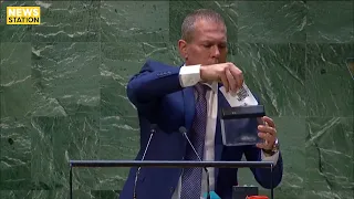 Israeli ambassador shreds UN charter with tiny shredder