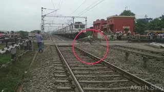 Train hits Bicycle  drunk  Man Crossing Track infront Of high speed Train