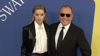 Amber Heard and Michael Kors at the 2018 CFDA Fashion Awards red carpet in New York
