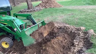 Moving and smoothing dirt with a sub compact tractor