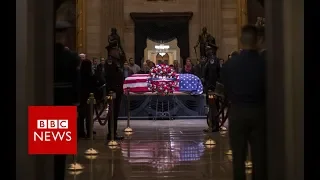 George HW Bush casket arrives in DC - BBC News