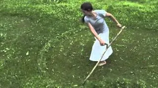 Scything lawn-length grass
