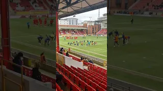 Leyton Orient and AFC Wimbledon warm up before the match. #football