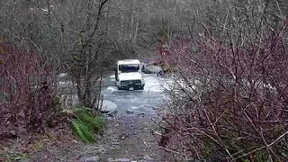 Mercedes Unimog U100L Turbo river crossing