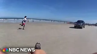 Body cam shows teen pulling gun on Florida beach