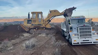 4G - CAT 973 Track Loader Operator Loading Super 10 Dump Truck