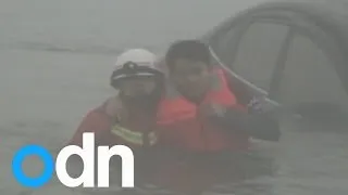 Driver rescued after plunging car into Chinese river in heavy fog