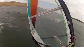 Windsurfing jibe using small waves