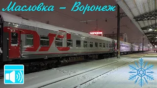 Night views of snow-covered Voronezh from the train window. Maslovka - Voronezh by russian train