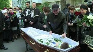 Relatives of Odessa inferno young victim grieve at funeral