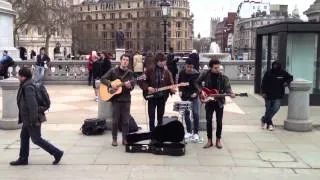 Beatles-like band in Trafalgar Square London